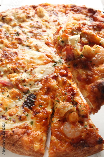 close up of gourmet seafood pizza