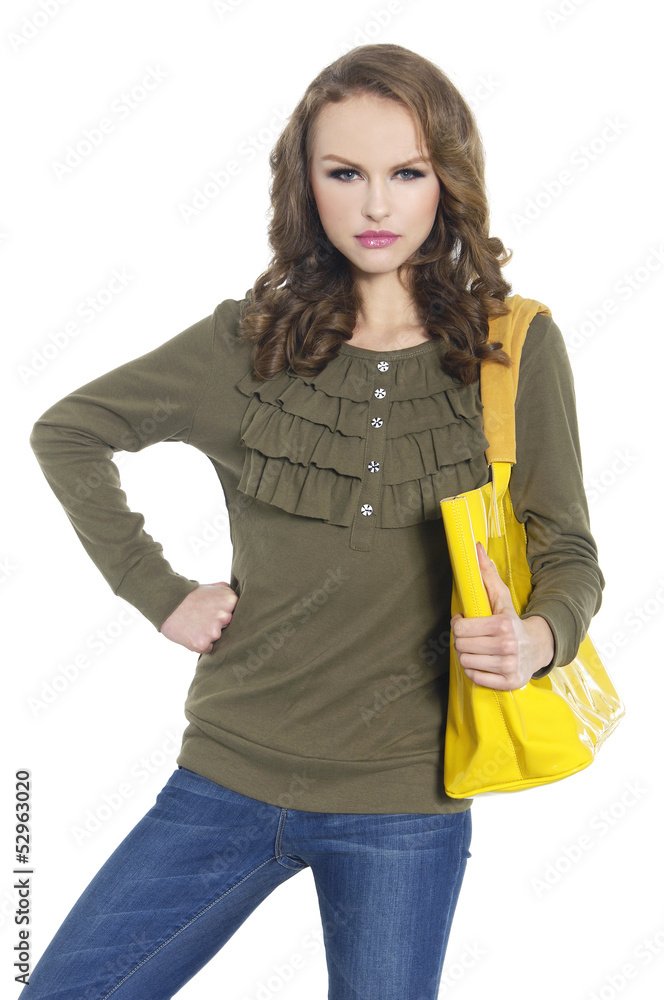 portrait of young woman in jeans with yellow bag posing portrait of young woman in jeans with yellow bag posing