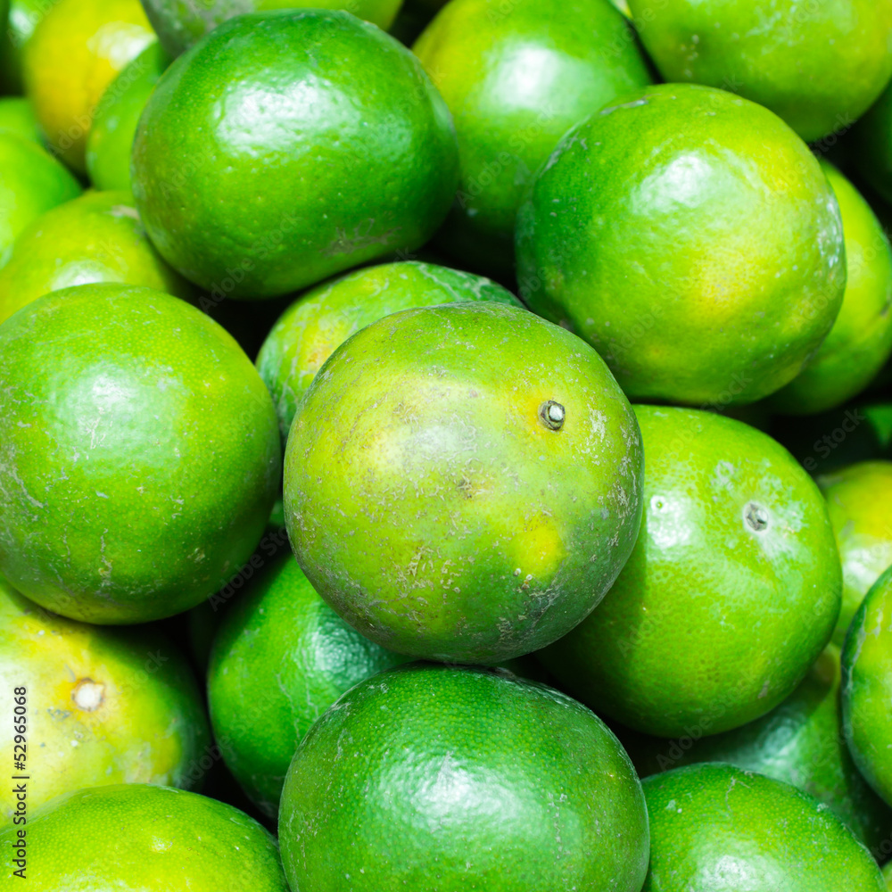 close up green orange at the market close up green orange at the market