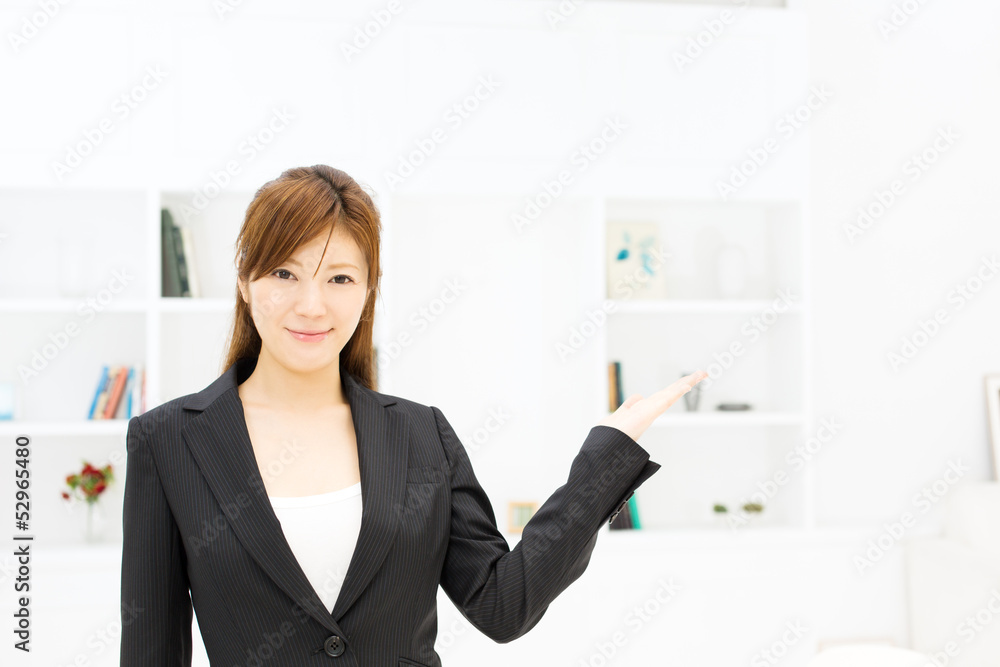 Beautiful young businesswoman working in office Beautiful young businesswoman working in office