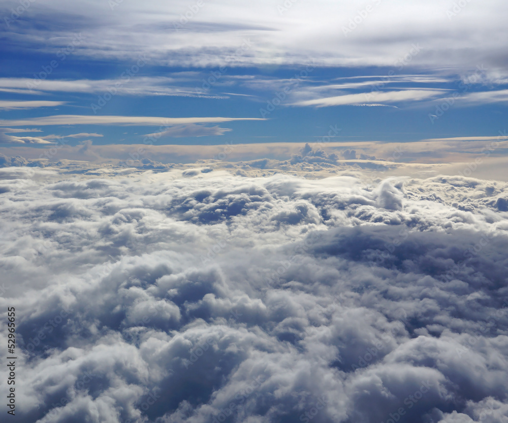 High altitude, aerial view, cloudscape on top of a cloud layer