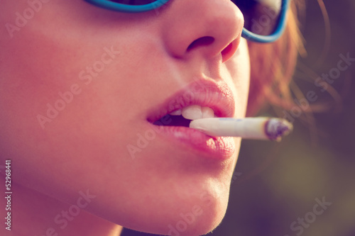 woman smoke a cigarette