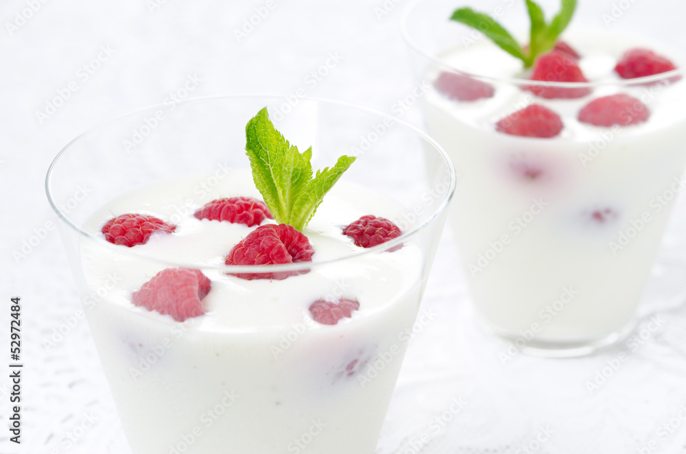 close-up of panna cotta with fresh raspberries close-up of panna cotta with fresh raspberries