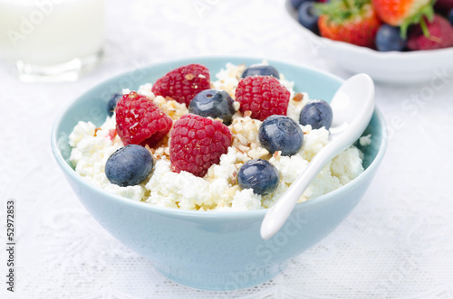 cottage cheese with fresh berries, honey and nuts
