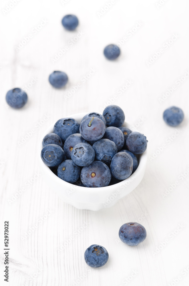 Fresh blueberries in a bowl, vertical, top view Fresh blueberries in a bowl, vertical, top view