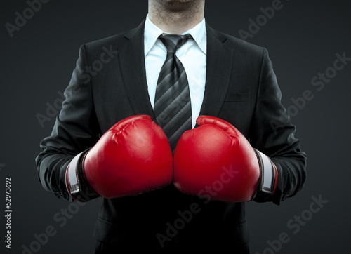 businessman in boxing gloves © peshkova