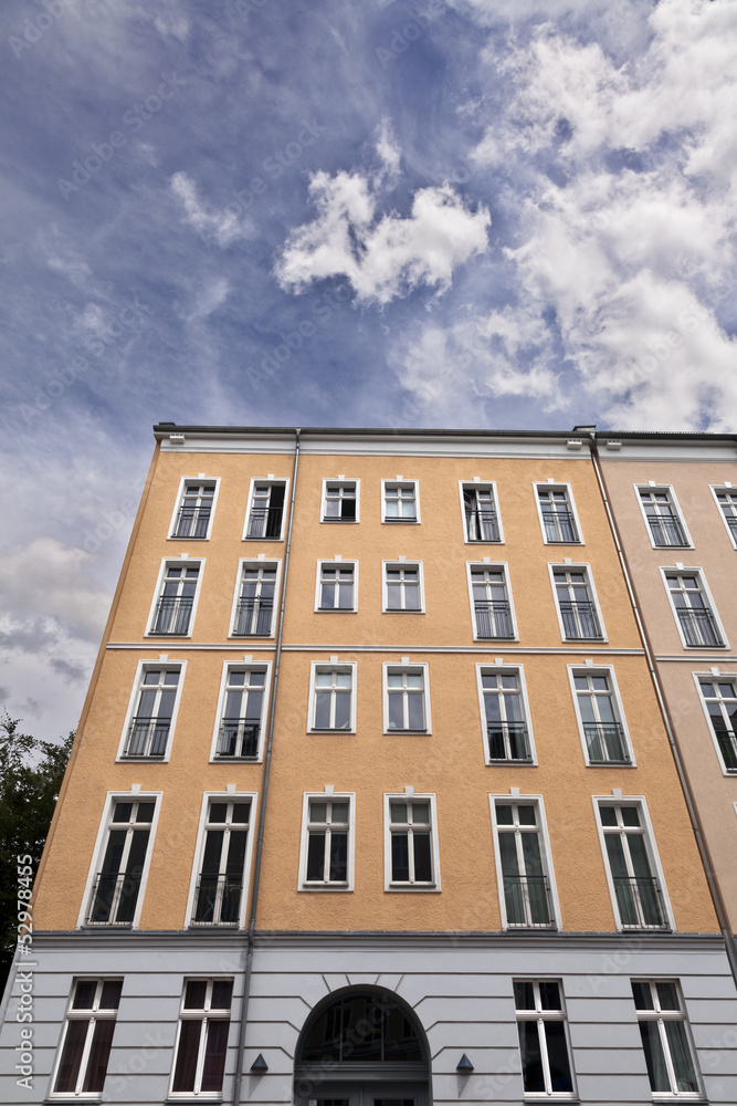 East Berlin Low Angle Building and Cloudy Sky East Berlin Low Angle Building and Cloudy Sky