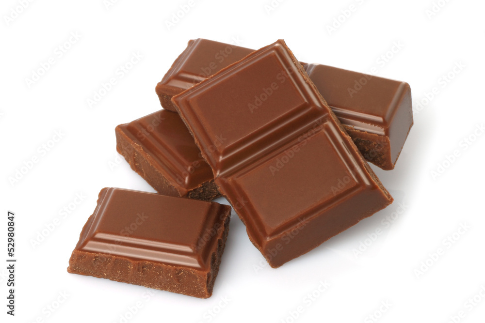 Broken milk chocolate bar isolated on white background . Broken milk chocolate bar isolated on white background .