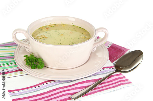 Nourishing soup with vegetables in pan isolated on white