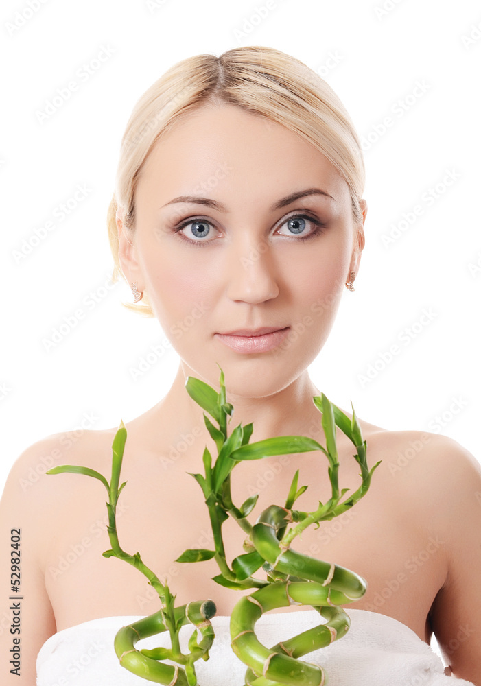 The beautiful young woman with a green bamboo The beautiful young woman with a green bamboo