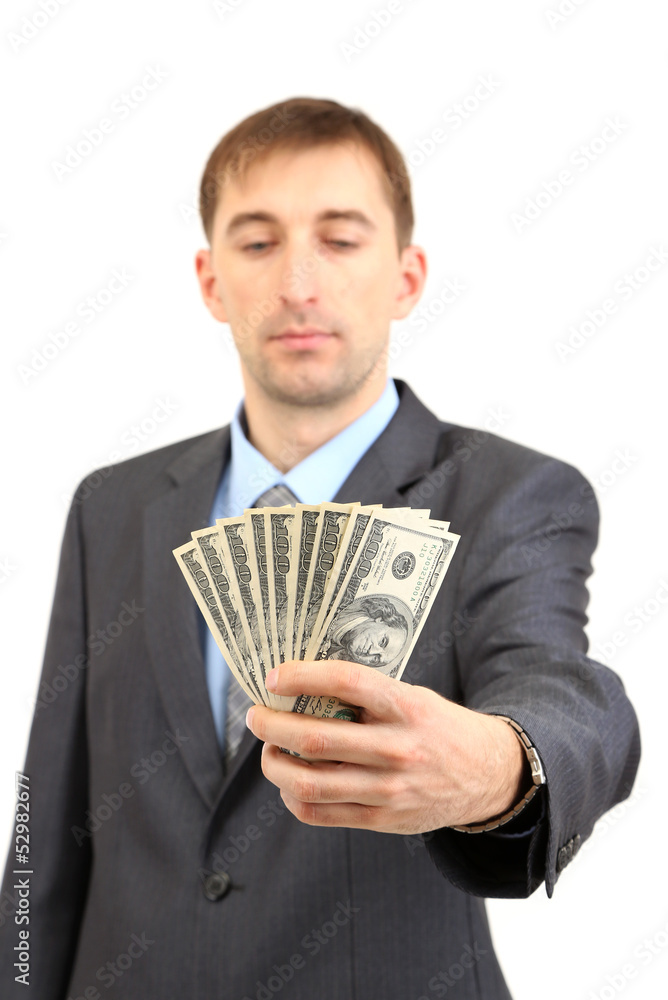 Young businessman with money isolated on white. Young businessman with money isolated on white.