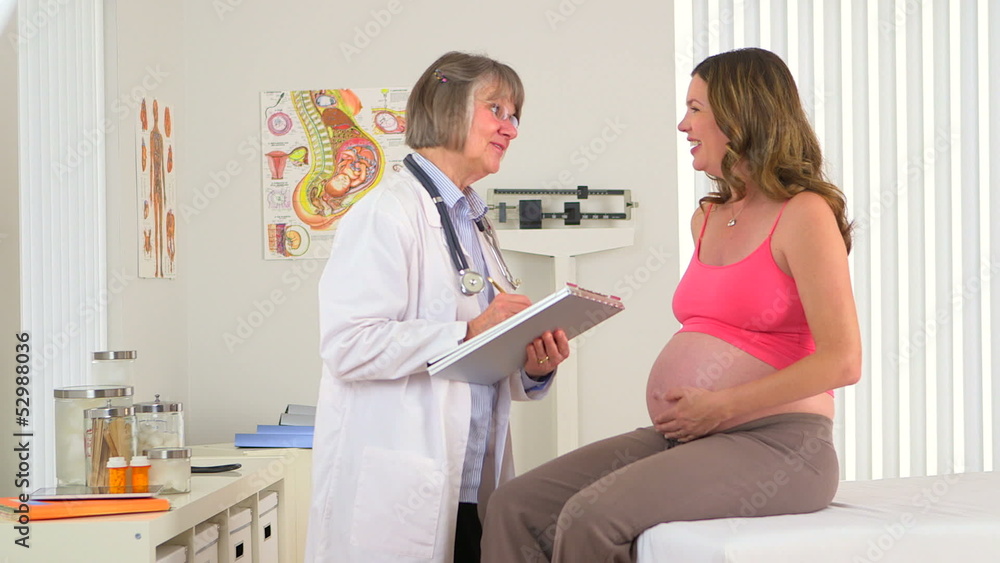 Pregnant Woman having a checkup Pregnant Woman having a checkup