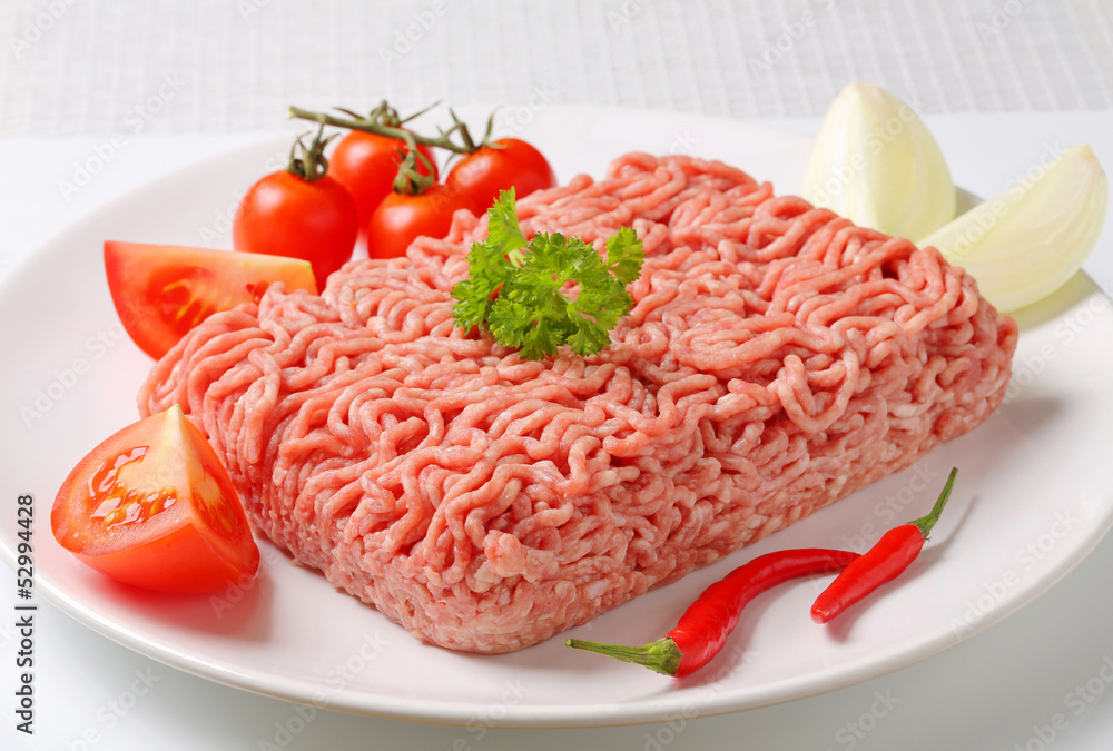 Raw ground pork and vegetables Raw ground pork and vegetables