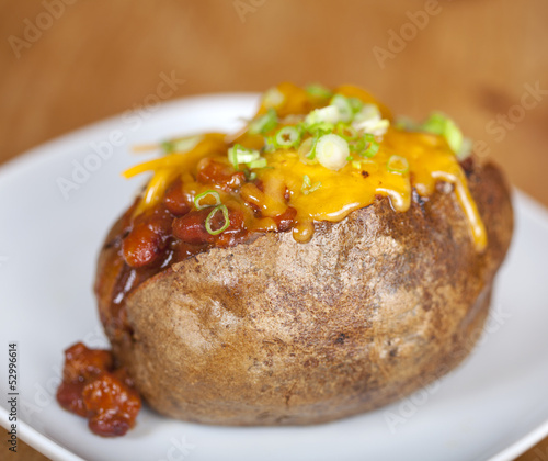 Loaded baked potato with chili and cheese
