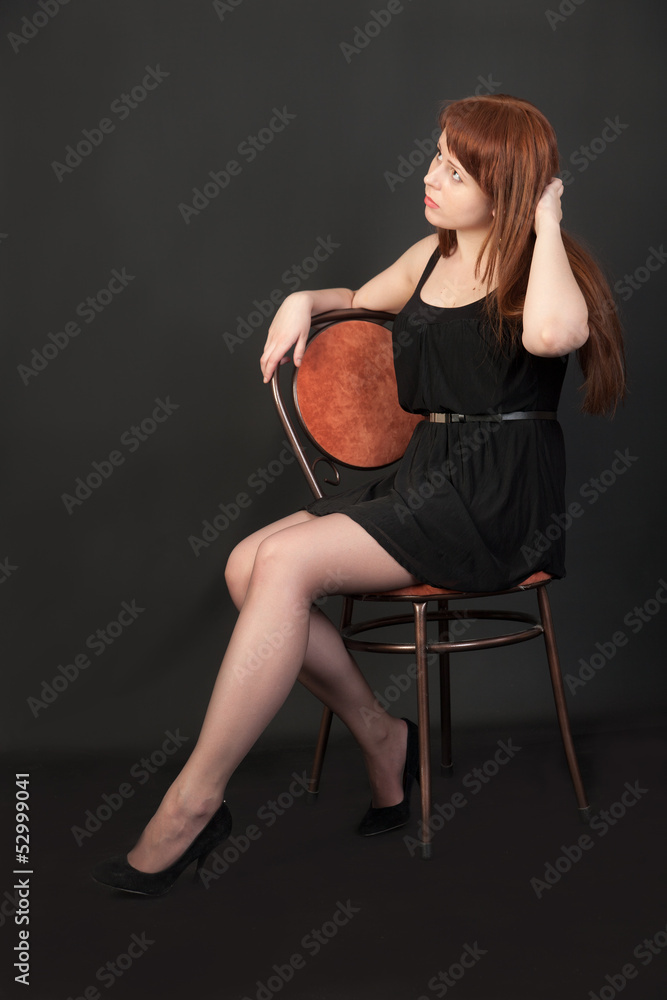 Fototapeta premium girl on a chair
