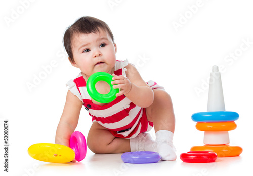 toddler girl playing with p...