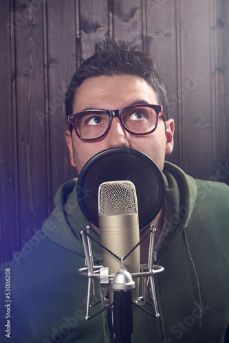 boy with microphone recording photo