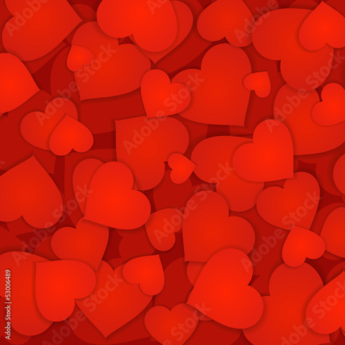 Red hearts of many sizes background