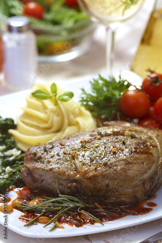 Delicious beef steak with spaniard and potatoes