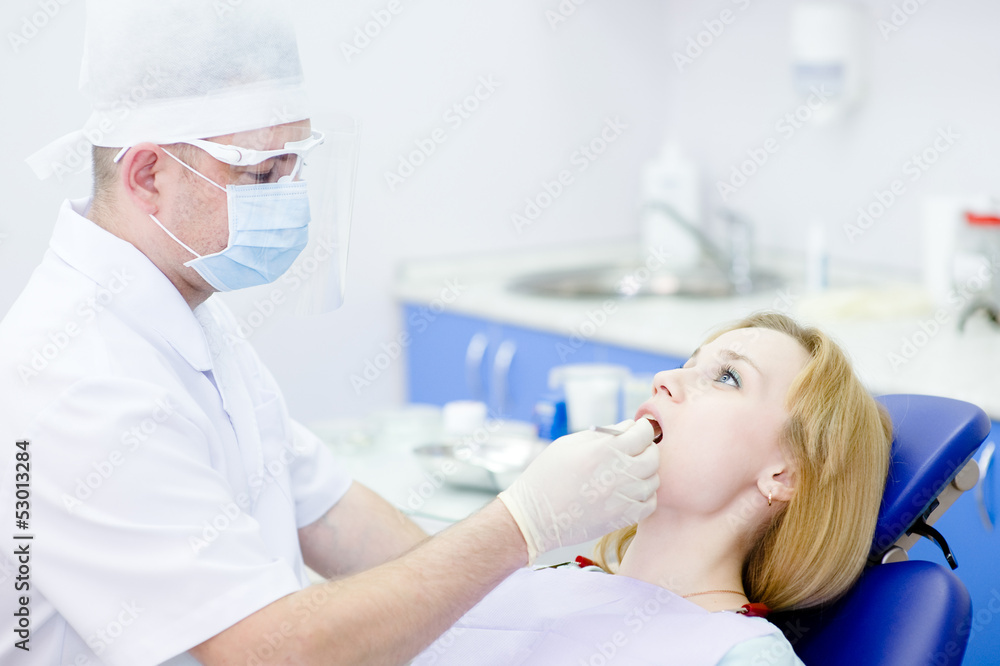 Fototapeta premium young girl visit to the dentist