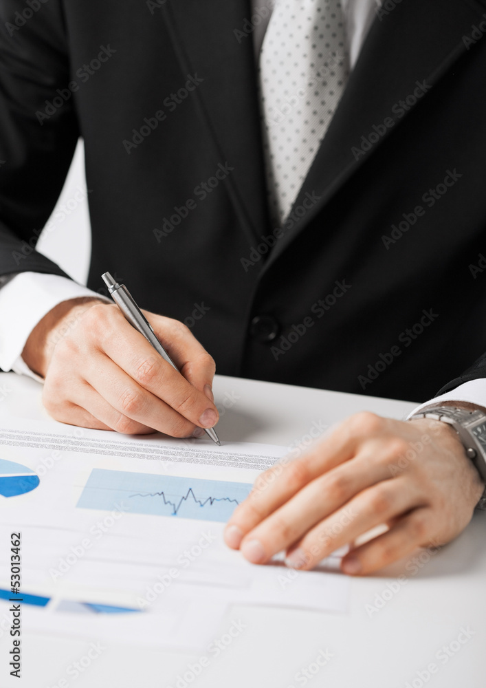 businessman working and signing paper businessman working and signing paper