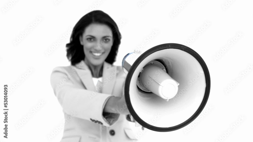 Businesswoman showing megaphone to the camera
