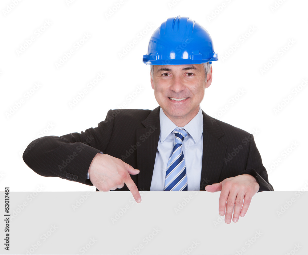 Mature Male Architect Holding Billboard Mature Male Architect Holding Billboard
