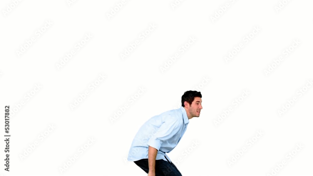 Young man jumping on white background Young man jumping on white background