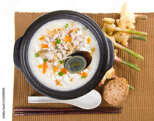 Traditional chinese century egg & pork porridge rice gruel serve