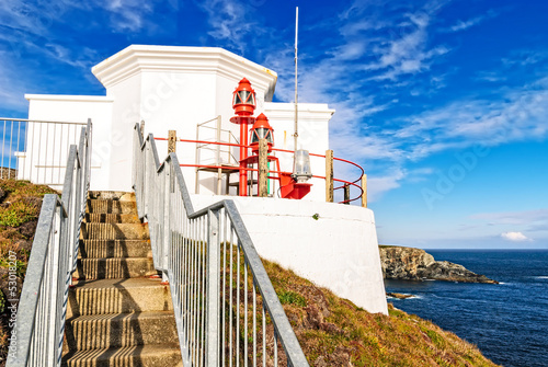 Lighthouse at Mizen Head, County Cork, Ireland photo