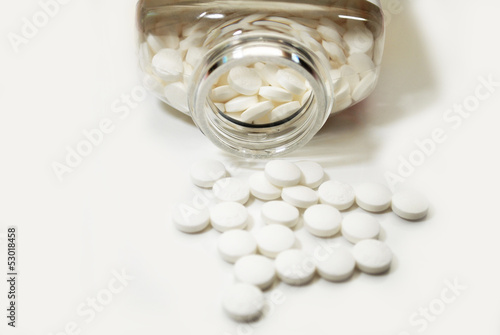 Aspirin Bottle with Aspirins photo