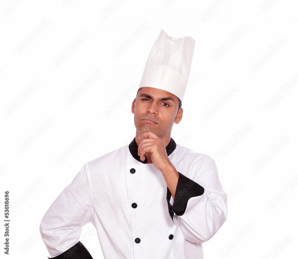 Pensive professional chef looking at you Pensive professional chef looking at you