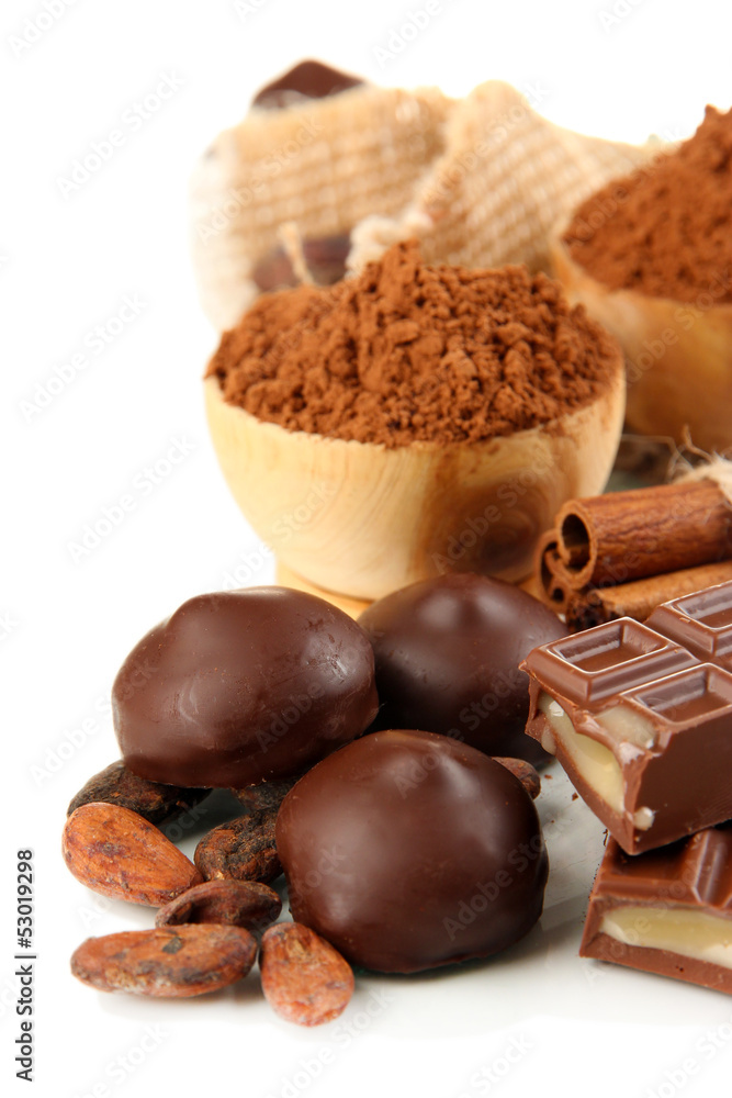 Composition of chocolate sweets, cocoa and spices, isolated Composition of chocolate sweets, cocoa and spices, isolated
