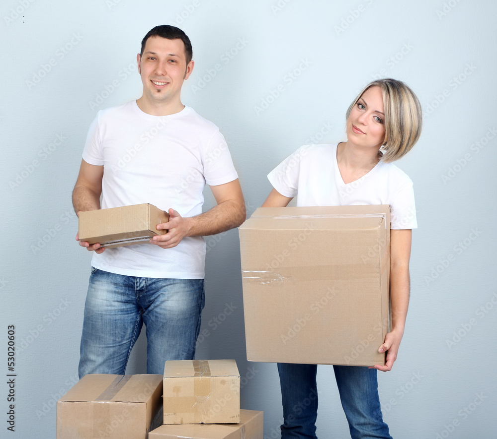 Young couple moving in new house Young couple moving in new house