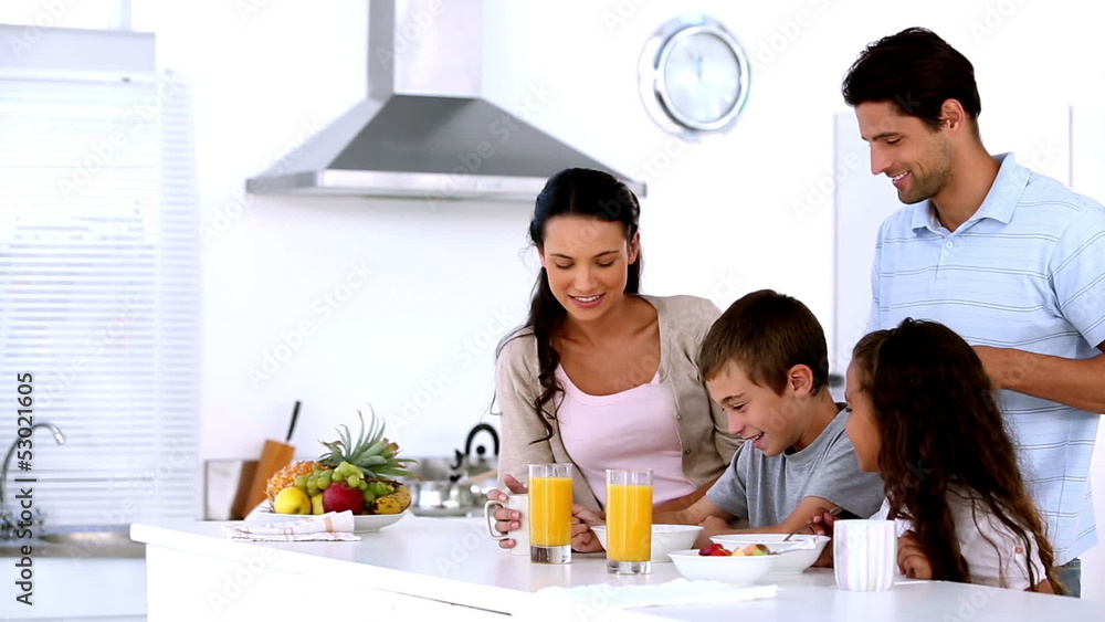Family having breakfast together Family having breakfast together