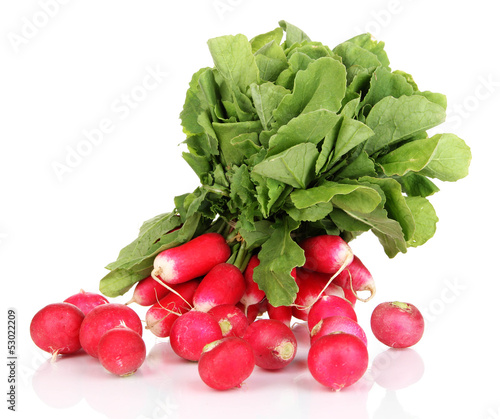 Small garden radish with leaves isolated on white