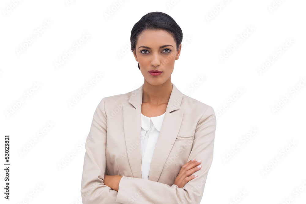 Serious businesswoman with arms crossed Serious businesswoman with arms crossed