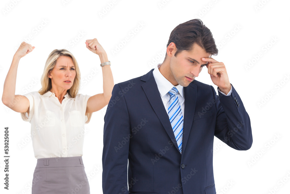 Winning businesswoman her anxious coworker Winning businesswoman her anxious coworker