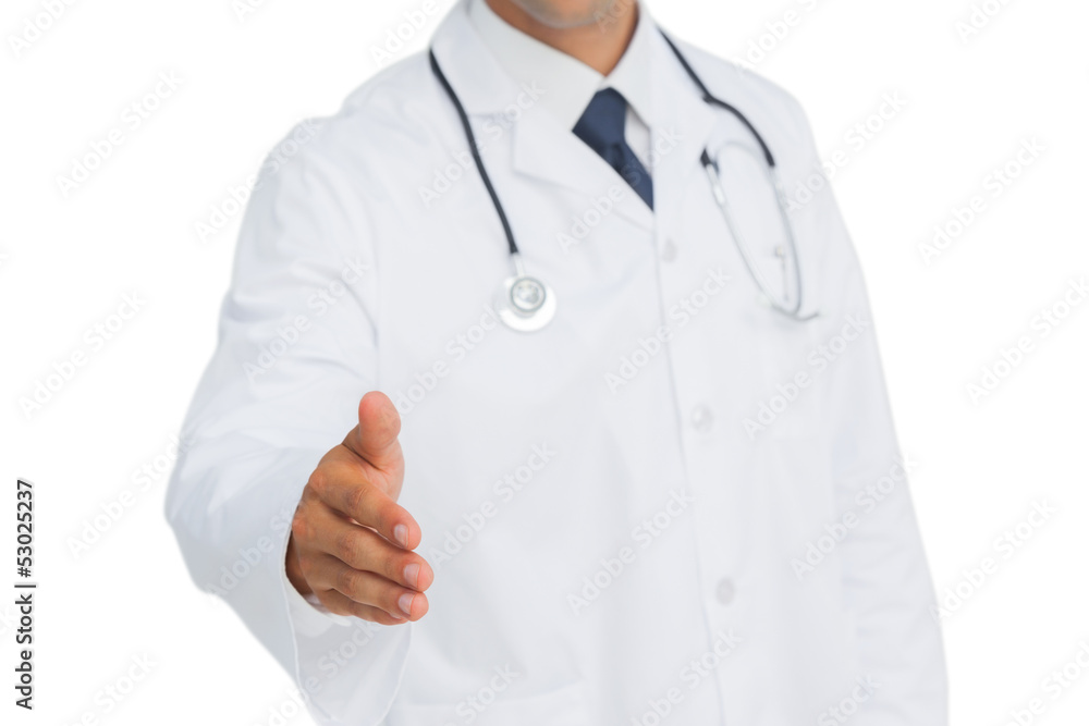 Doctor reaching out for a handshake Doctor reaching out for a handshake
