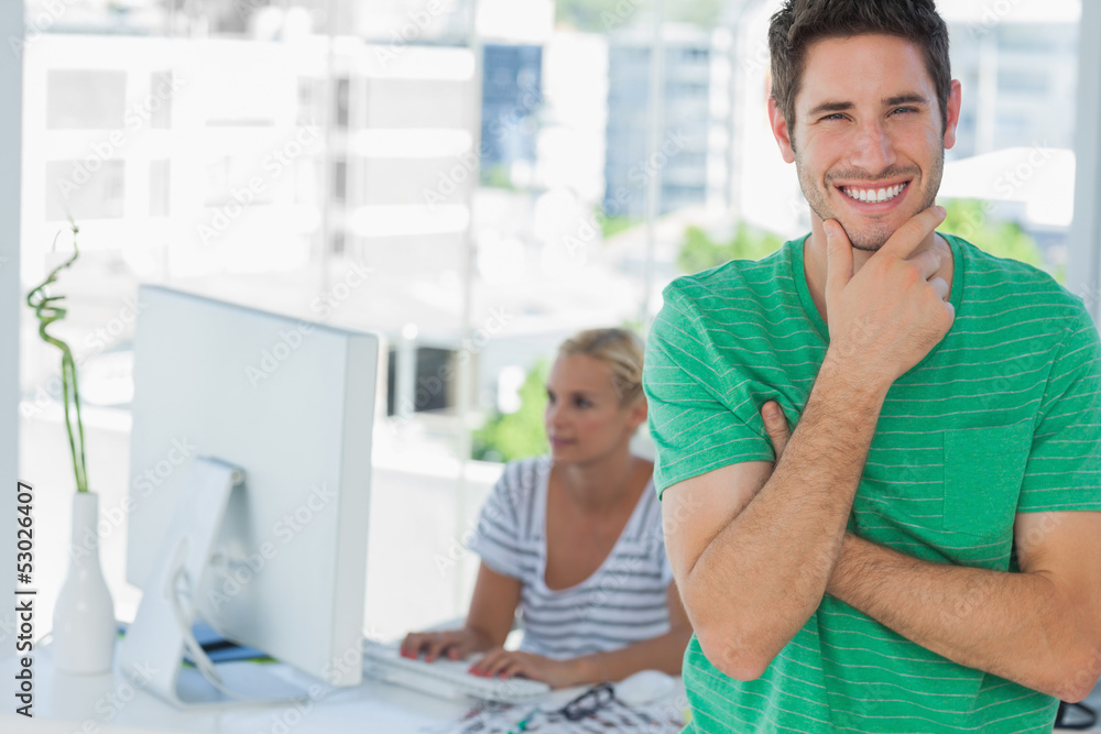 Fototapeta premium Attractive designer posing in his office