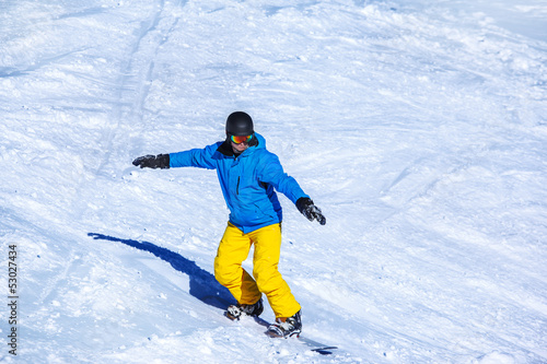 Man in snowboard helmet and goggles