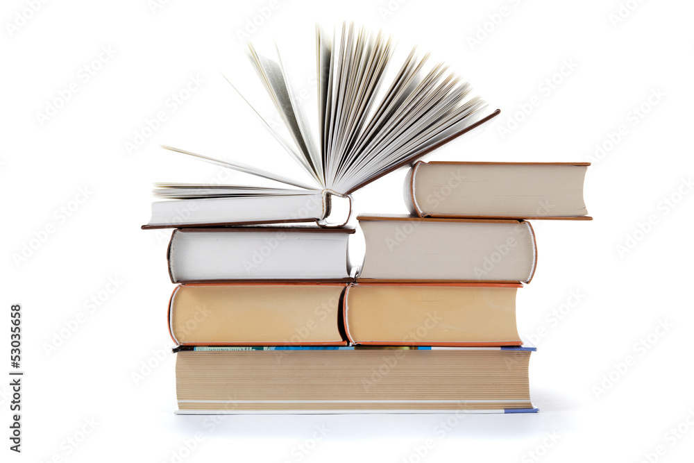 A stack of books on a white background. A stack of books on a white background.