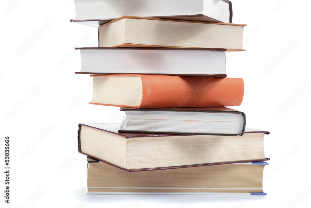 A stack of books on a white background. A stack of books on a white background.