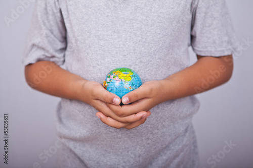 hands and earth globe.