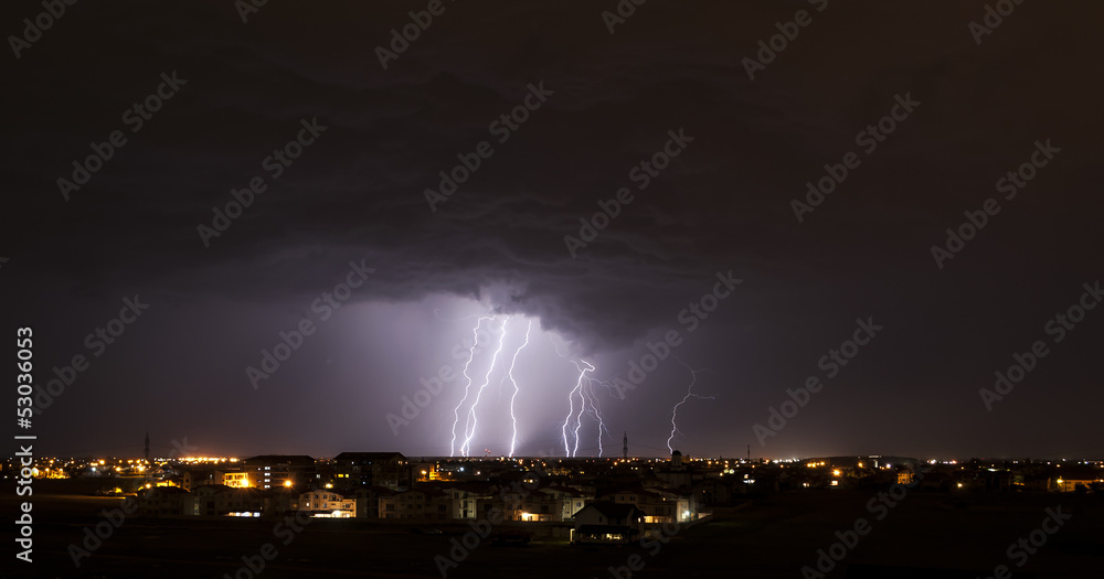 Lightning over small town