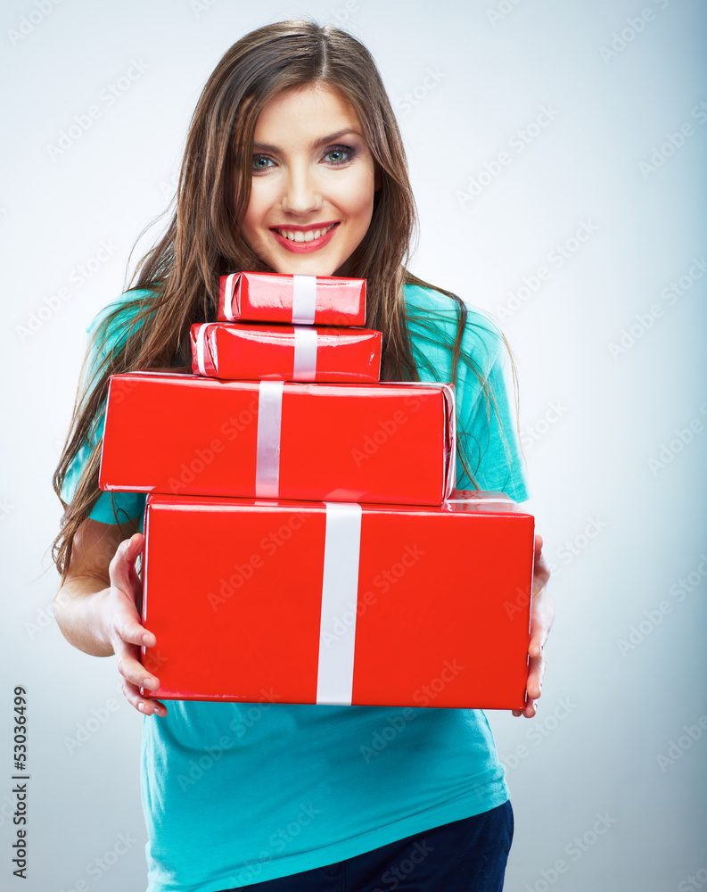 Portrait of young happy smiling woman hold red gift box. Isolat Portrait of young happy smiling woman hold red gift box. Isolat
