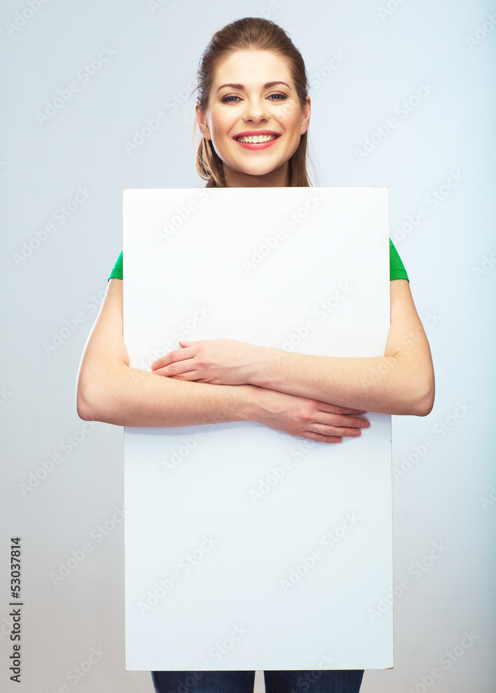 Woman holding blank poster isolated portrait. Woman holding blank poster isolated portrait.