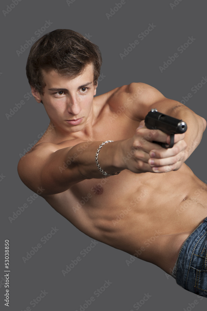 Young guy with a gun Young guy with a gun