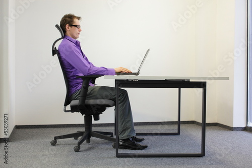 correct sitting position at laptop photo
