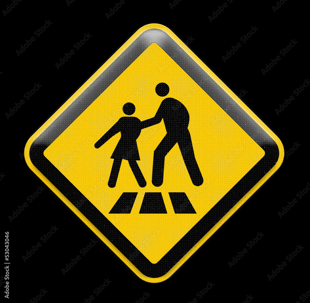 Bright yellow pedestrian crosswalk sign on a busy street Bright yellow pedestrian crosswalk sign on a busy street